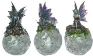 Metal Fairies on crystal ball